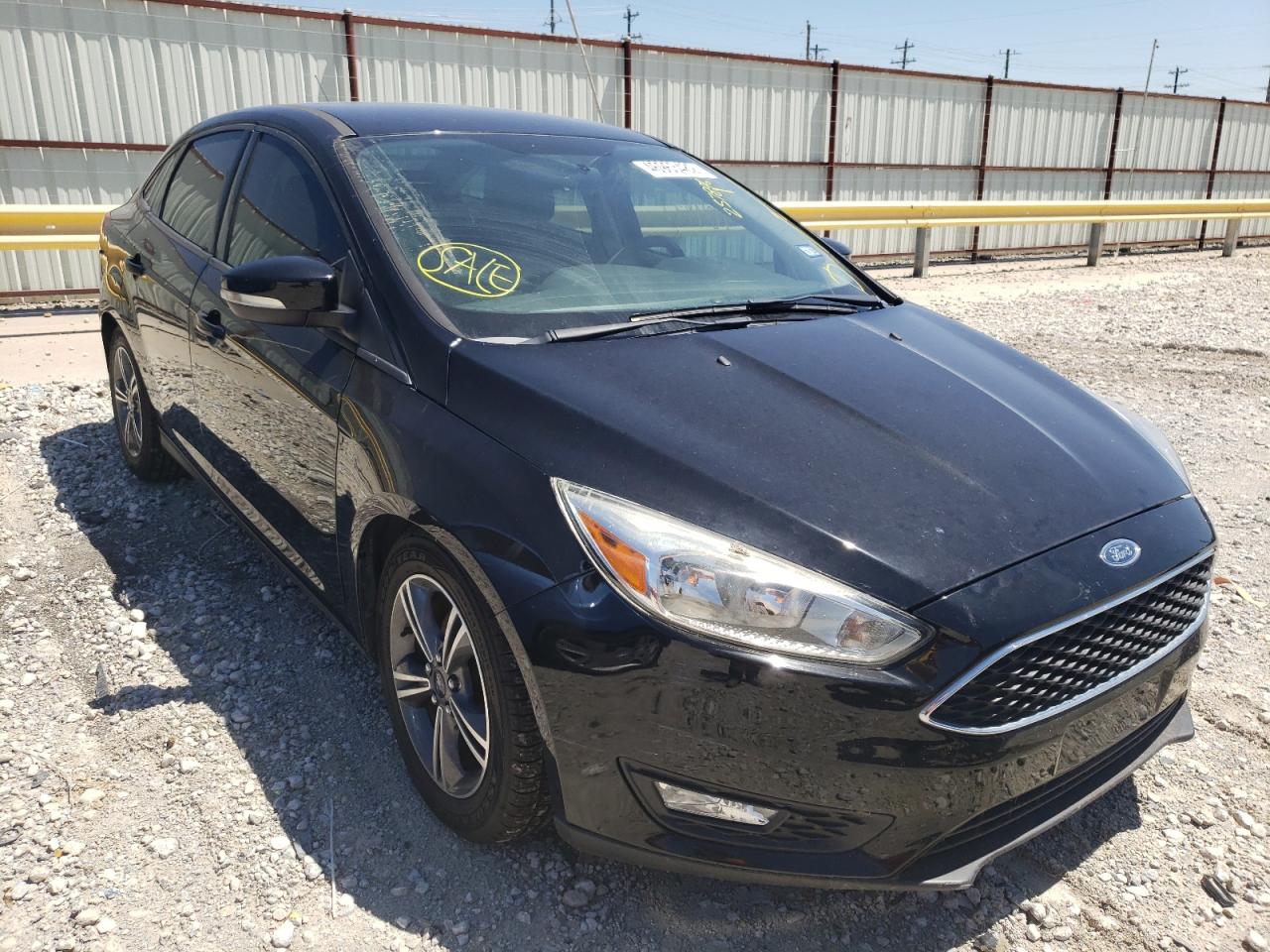 Photo 20 from auction – 2016 FORD FOCUS SE with VIN 1FADP3FE5GL257896