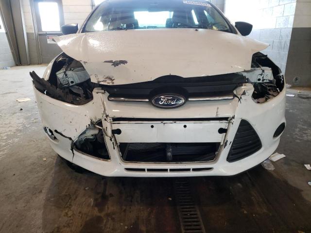 Photo 9 from auction – 2014 FORD FOCUS S with VIN 1FADP3E21EL251257