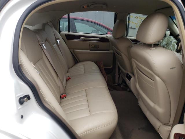 Photo 6 from auction – 2004 LINCOLN TOWN CAR E with VIN 1LNHM81W54Y687861