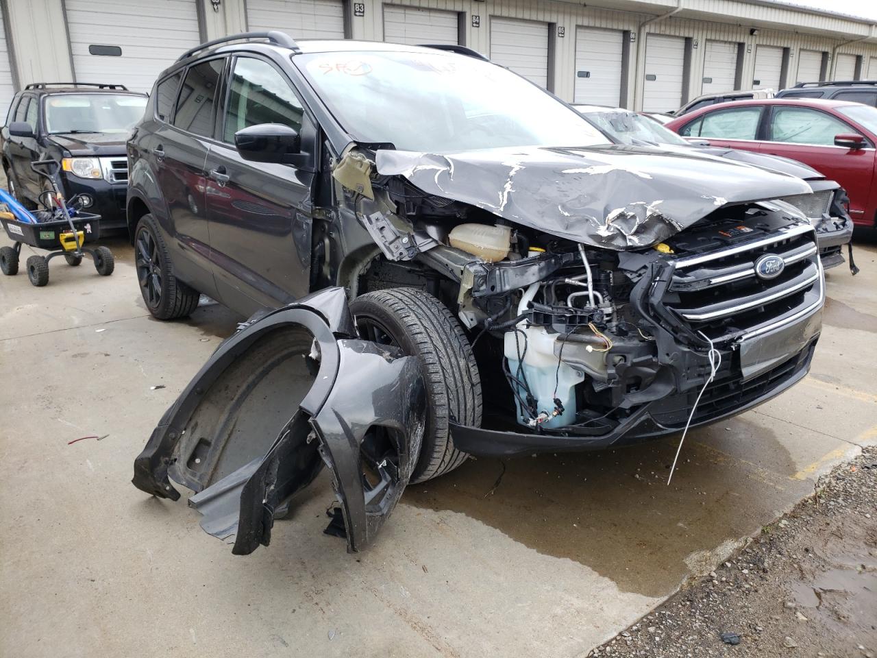 Photo 19 from auction – 2017 FORD ESCAPE SE with VIN 1FMCU0G99HUB87440