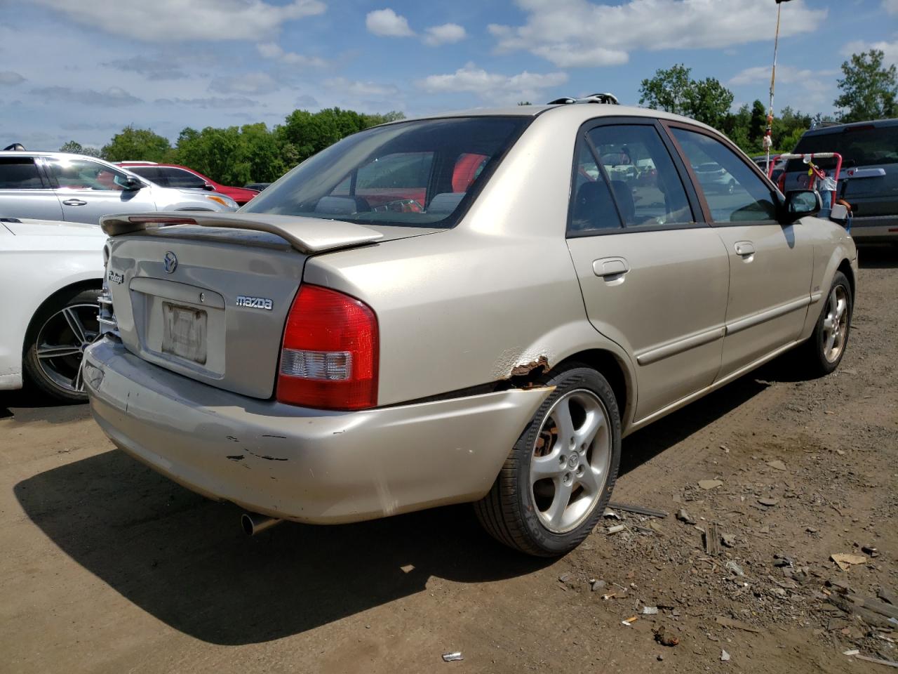 Photo 4 from auction – 2002 MAZDA PROTEGE DX with VIN JM1BJ225320524465