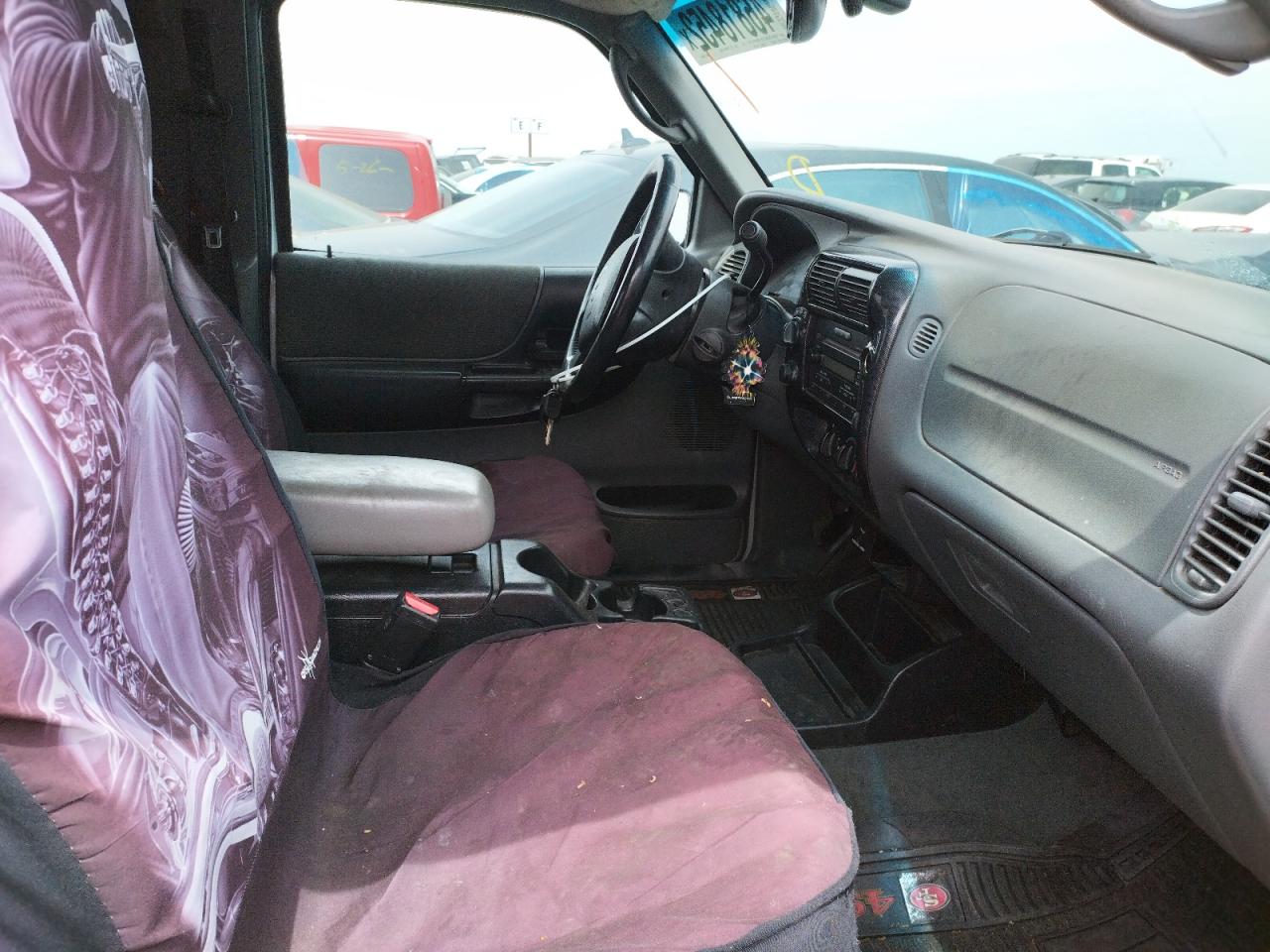 Photo 5 from auction – 2004 MAZDA B4000 CAB with VIN 4F4ZR47E84TM07887