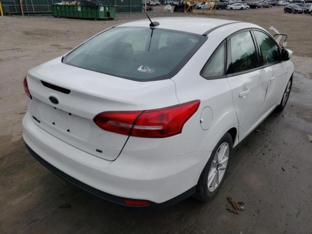 Photo 4 from auction – 2015 FORD FOCUS SE with VIN 1FADP3F27FL285493