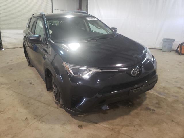 TOYOTA RAV4 LE 2018 with VIN 2T3BFREV3JW842909 - Photo from auction