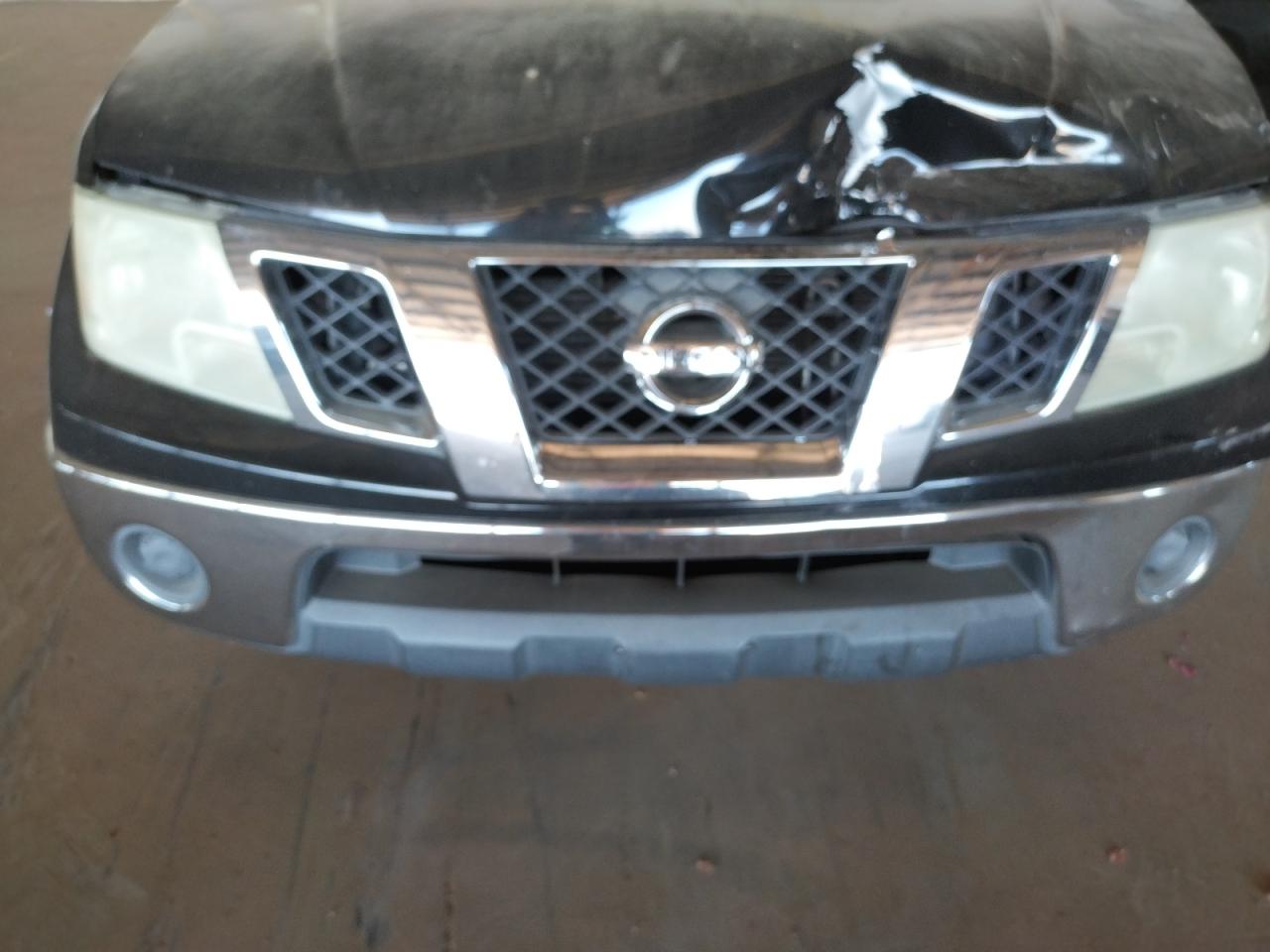 Photo 9 from auction – 2009 NISSAN FRONTIER K with VIN 1N6BD06T69C402158