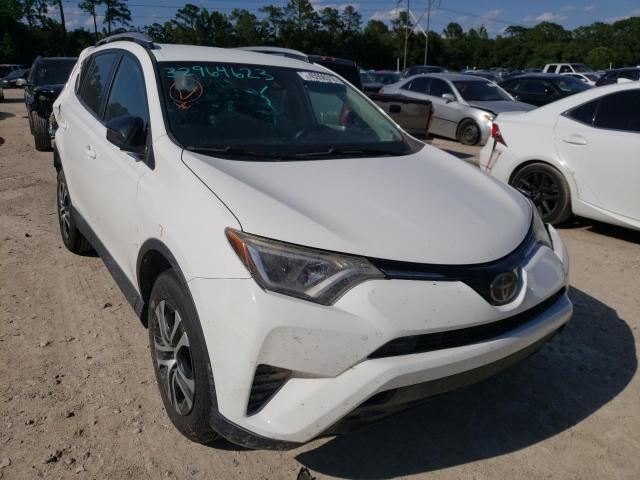 TOYOTA RAV4 LE 2017 with VIN 2T3ZFREV2HW316599 - Photo from auction
