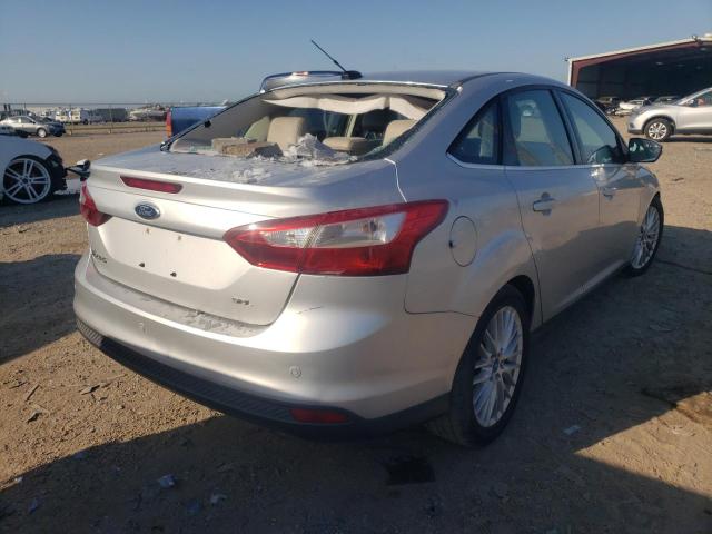 Foto 7 de la subasta – 2012 FORD FOCUS SEL con VIN 1FAHP3H2XCL177007