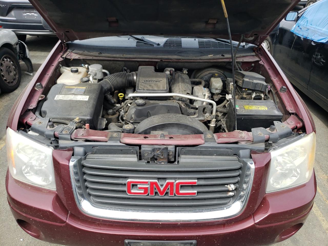 Photo 12 from auction – 2005 GMC ENVOY with VIN 1GKDT13S952100920