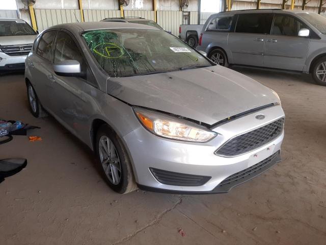 FORD FOCUS SE 2018 with VIN 1FADP3K28JL220618 - Photo from auction