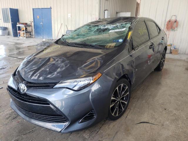 Photo 2 from auction – 2018 TOYOTA COROLLA L with VIN 5YFBURHEXJP825844