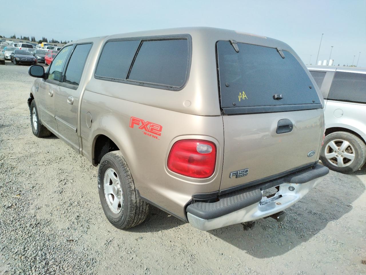 Photo 16 from auction – 2002 FORD F150 SUPER with VIN 1FTRW07L02KB59470
