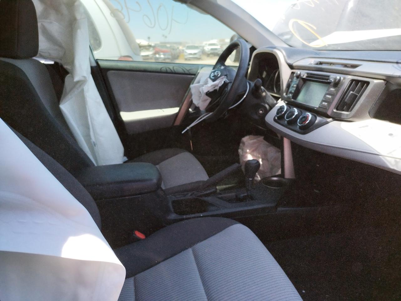 Photo 5 from auction – 2014 TOYOTA RAV4 LE with VIN JTMZFREV4EJ017075