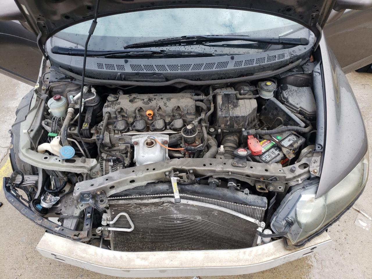 Photo 12 from auction – 2010 HONDA CIVIC LX with VIN 19XFA1F59AE002516