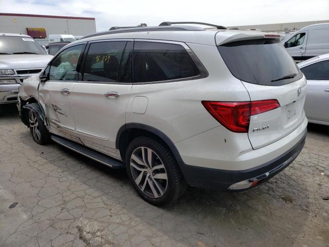 Photo 3 from auction – 2017 HONDA PILOT TOUR with VIN 5FNYF5H91HB011376