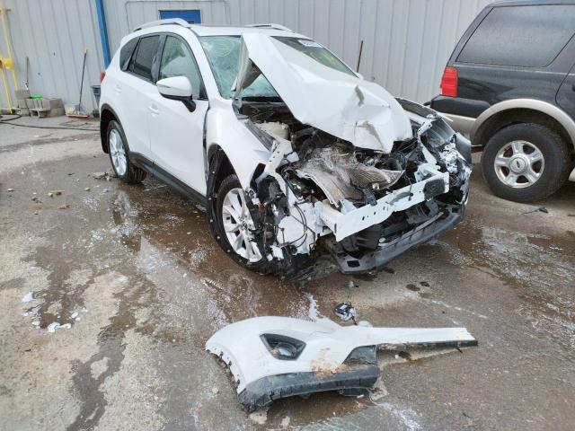 MAZDA CX-5 GT 2015 with VIN JM3KE4DYXF0554373 - Photo from auction