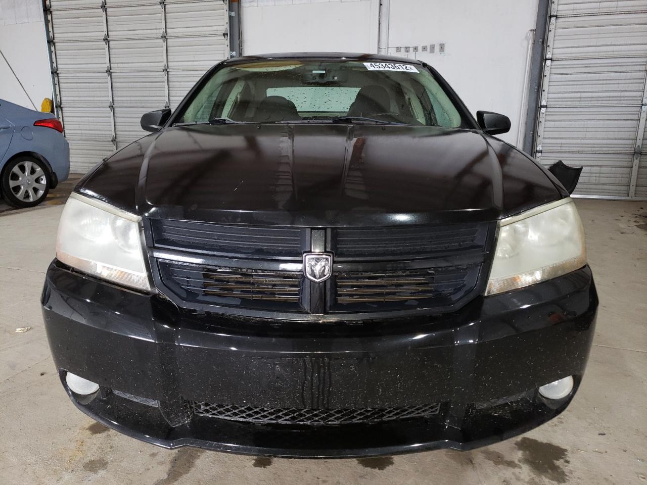 Photo 9 from auction – 2009 DODGE AVENGER SX with VIN 1B3LC56B69N548886