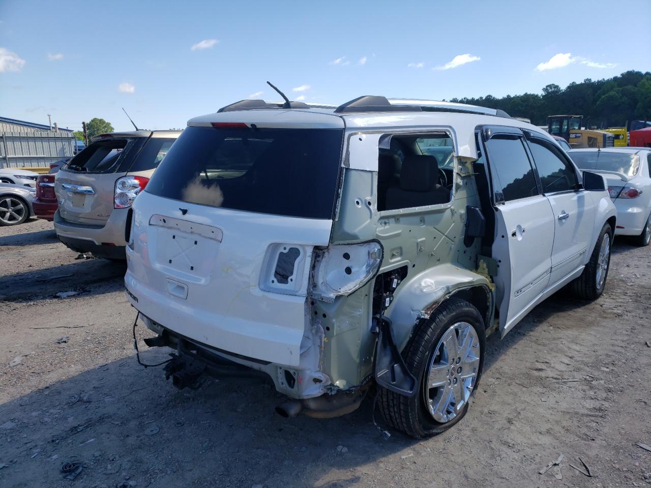 Photo 4 from auction – 2016 GMC ACADIA DEN with VIN 1GKKRTKD4GJ310595