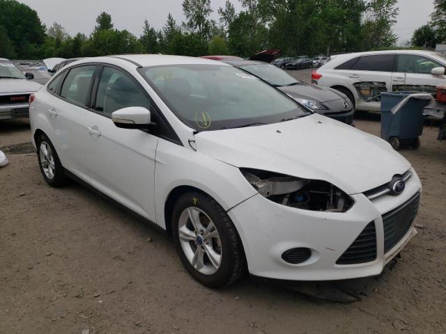 FORD FOCUS SE 2014 with VIN 1FADP3F24EL144749 - Photo from auction
