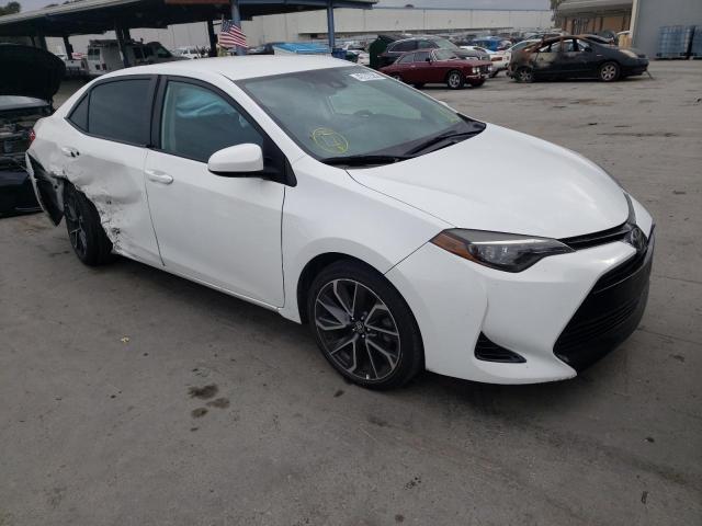 TOYOTA COROLLA L 2017 with VIN 5YFBURHE5HP675054 - Photo from auction