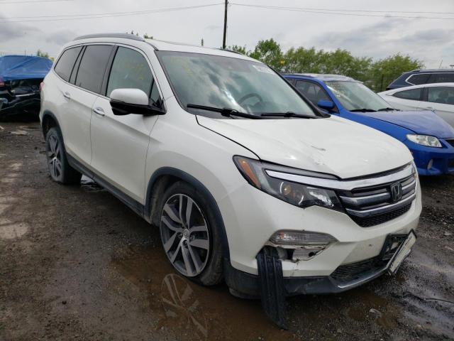HONDA PILOT TOUR 2017 with VIN 5FNYF6H92HB044456 - Photo from auction