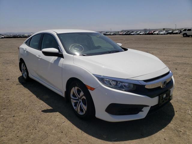 HONDA CIVIC LX 2018 with VIN 19XFC2F50JE004591 - Photo from auction