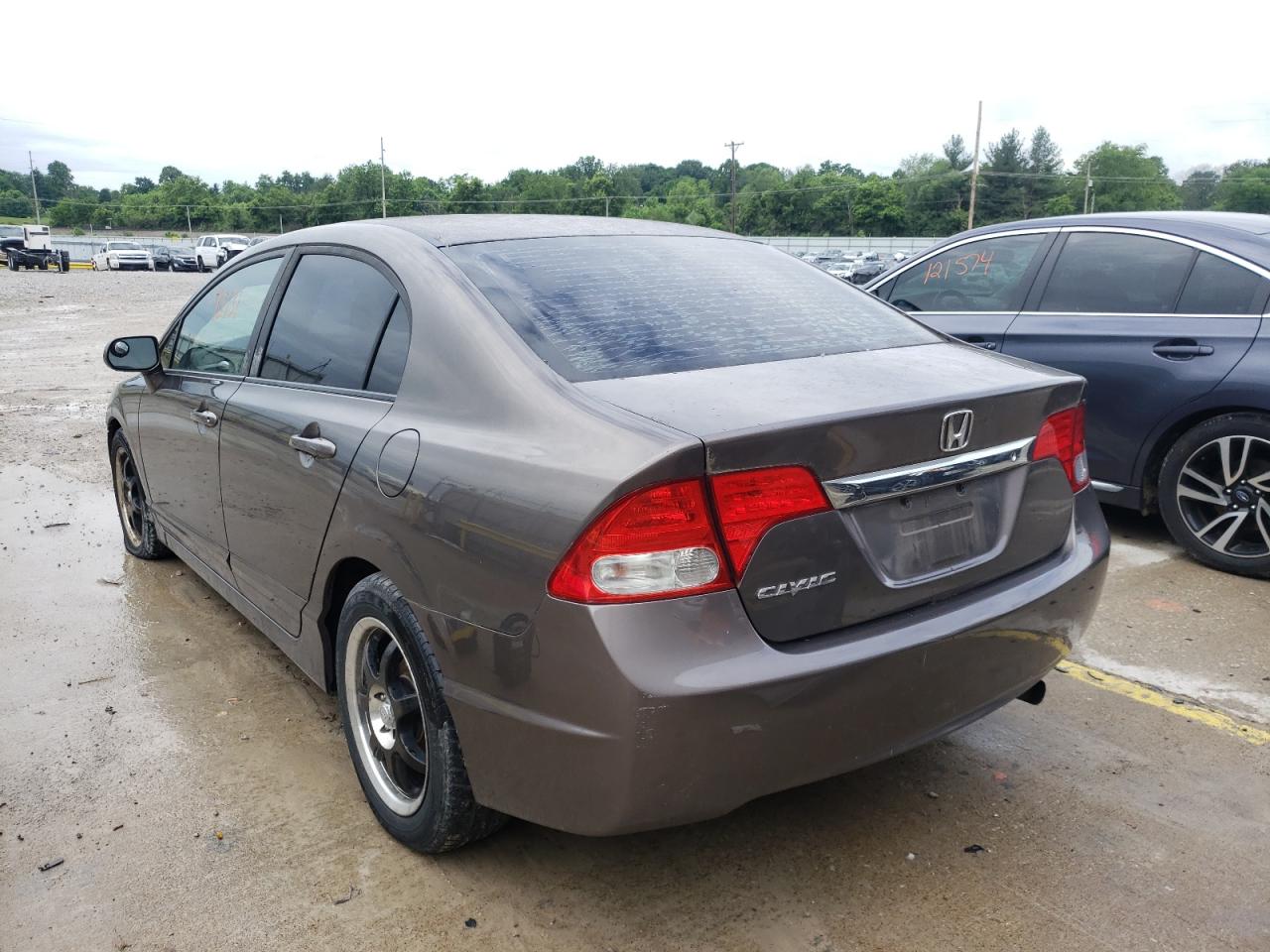 Photo 16 from auction – 2010 HONDA CIVIC LX with VIN 19XFA1F59AE002516
