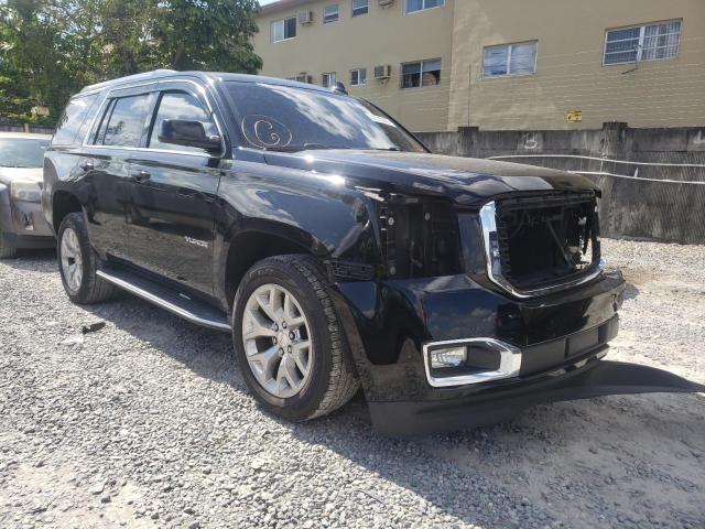 GMC YUKON SLE 2015 with VIN 1GKS1AKC8FR682069 - Photo from auction