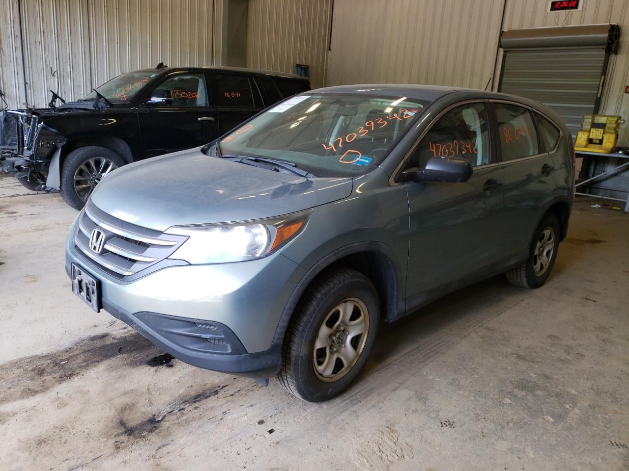 Photo 15 from auction – 2012 HONDA CR-V LX with VIN 2HKRM4H37CH602256