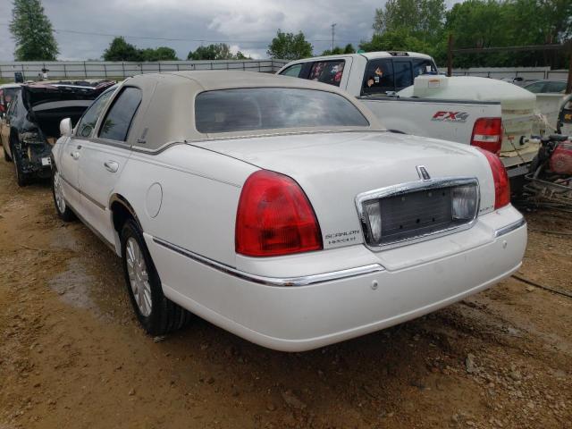 Photo 3 from auction – 2004 LINCOLN TOWN CAR E with VIN 1LNHM81W54Y687861