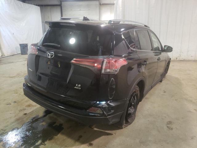 Photo 4 from auction – 2018 TOYOTA RAV4 LE with VIN 2T3BFREV3JW842909