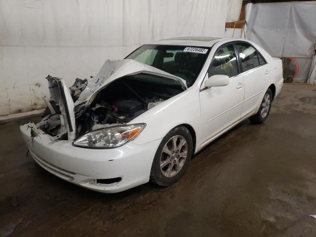 Photo 2 from auction – 2004 TOYOTA CAMRY LE with VIN JTDBE30K540259585