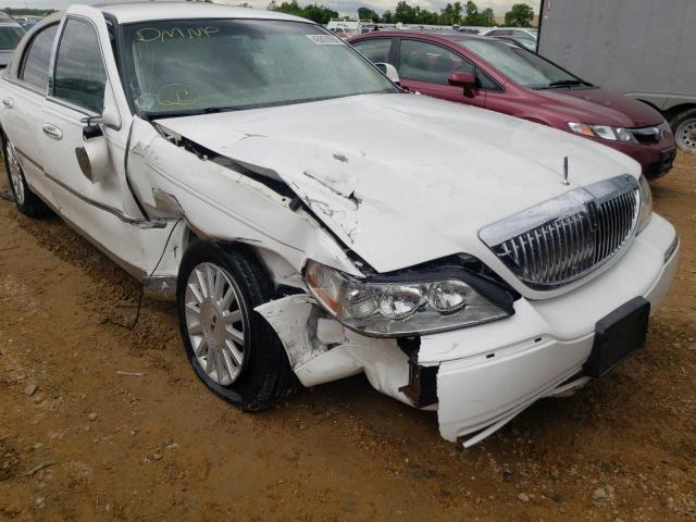 Photo 9 from auction – 2004 LINCOLN TOWN CAR E with VIN 1LNHM81W54Y687861
