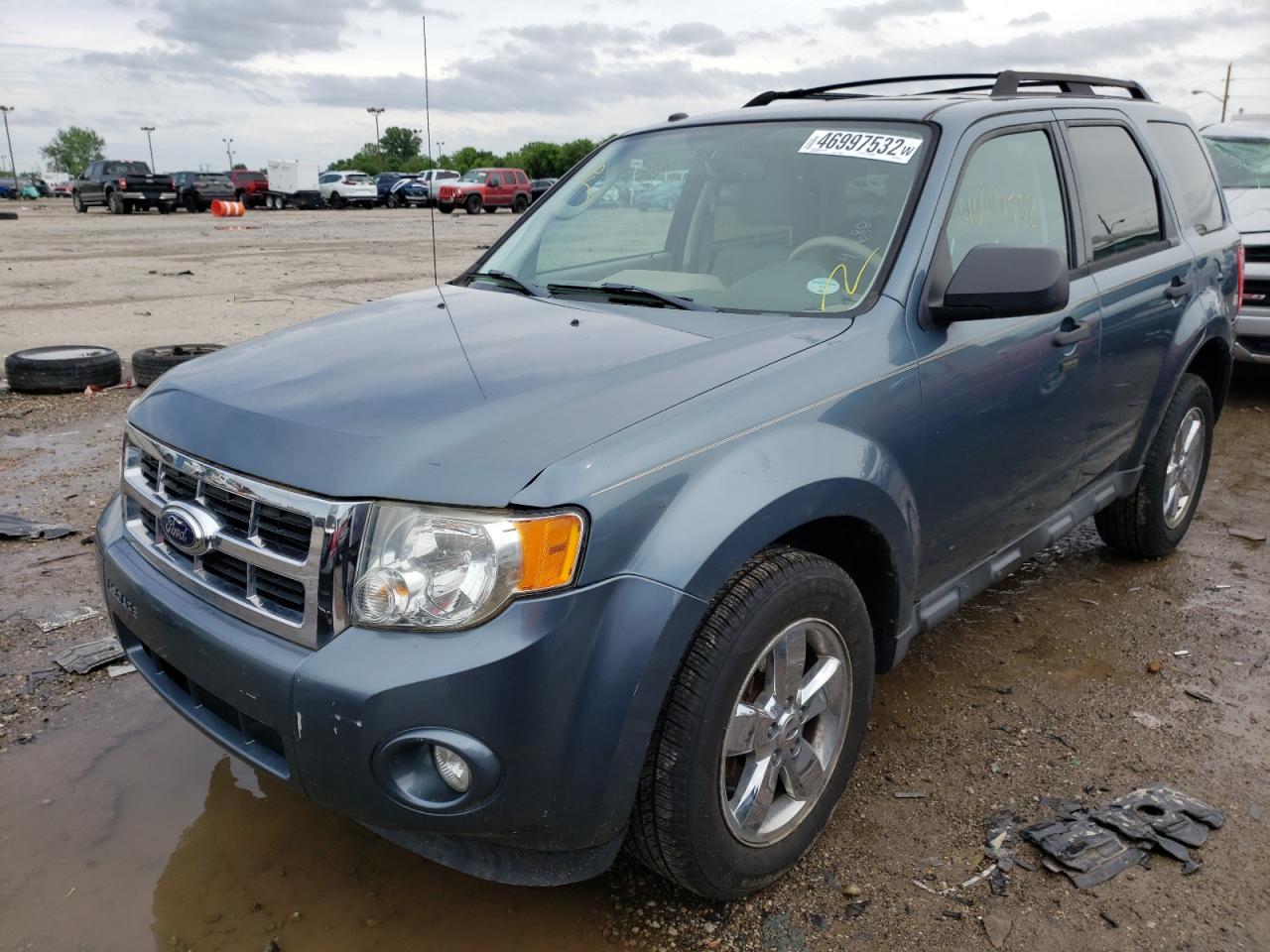 Photo 15 from auction – 2011 FORD ESCAPE XLT with VIN 1FMCU0D73BKB45142