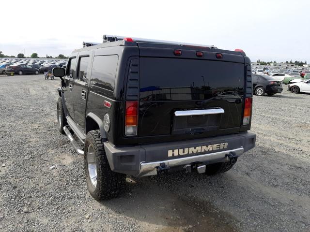 Photo 3 from auction – 2003 HUMMER H2 with VIN 5GRGN23U73H140951