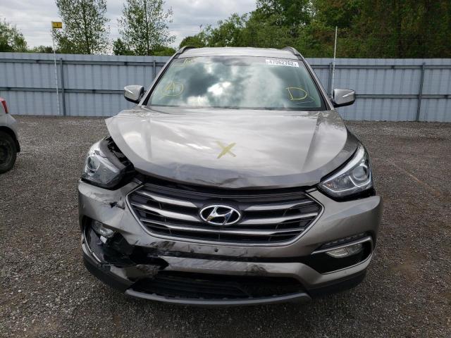 Photo 7 from auction – 2018 HYUNDAI SANTA FE S with VIN 5NMZU3LB2JH055058