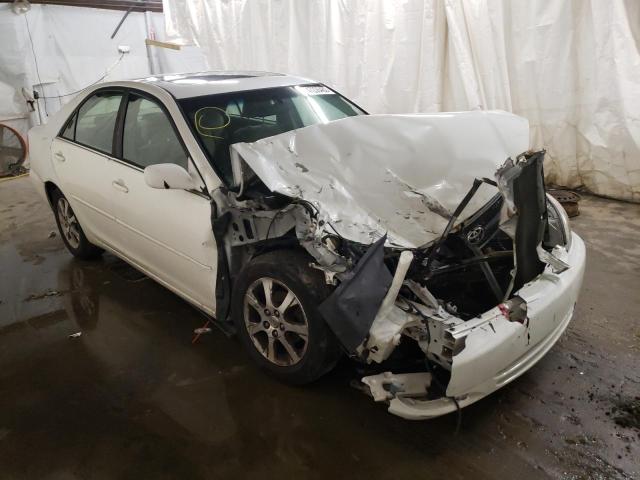 TOYOTA CAMRY LE 2004 with VIN JTDBE30K540259585 - Photo from auction