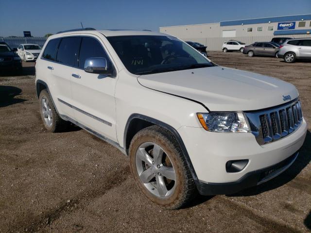 JEEP GRAND CHER 2011 with VIN 1J4RR6GT4BC583975 - Photo from auction