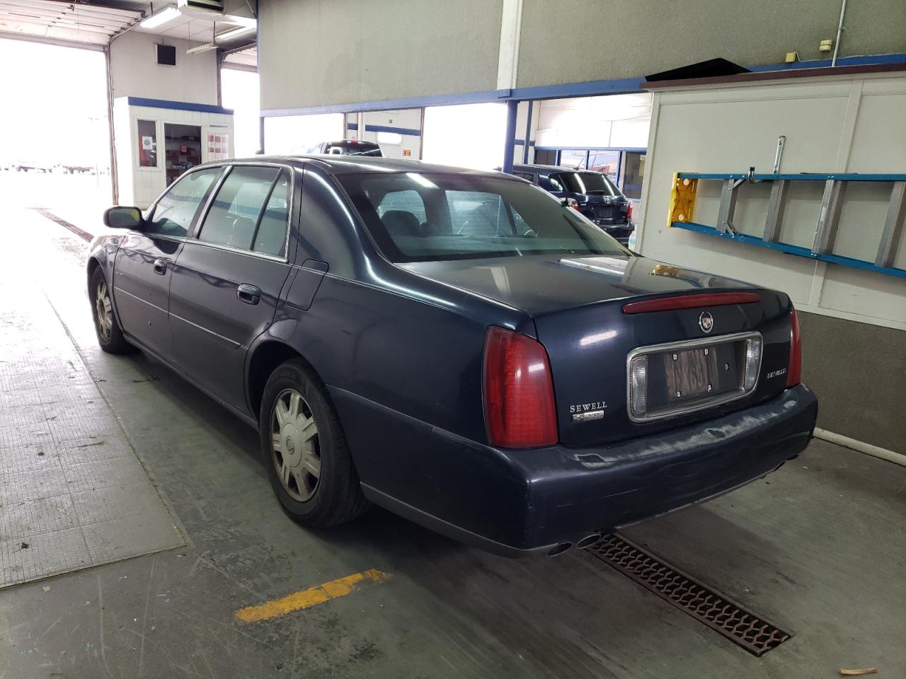 Photo 16 from auction – 2004 CADILLAC DEVILLE with VIN 1G6KD54Y44U144159