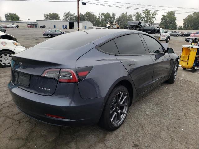 Photo 4 from auction – 2022 TESLA MODEL 3 with VIN 5YJ3E1EB1NF137133