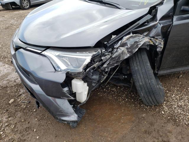 Photo 9 from auction – 2018 TOYOTA RAV4 LE with VIN JTMBFREV6JJ177339