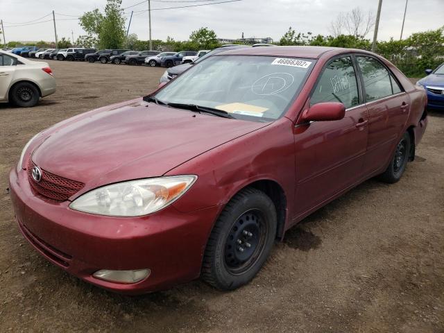 Photo 2 from auction – 2002 TOYOTA CAMRY LE with VIN JTDBF32K420044769