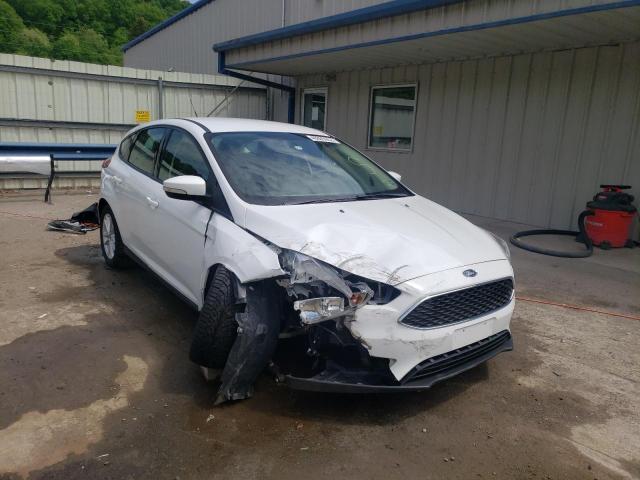 FORD FOCUS SE 2017 with VIN 1FADP3K21HL291122 - Photo from auction