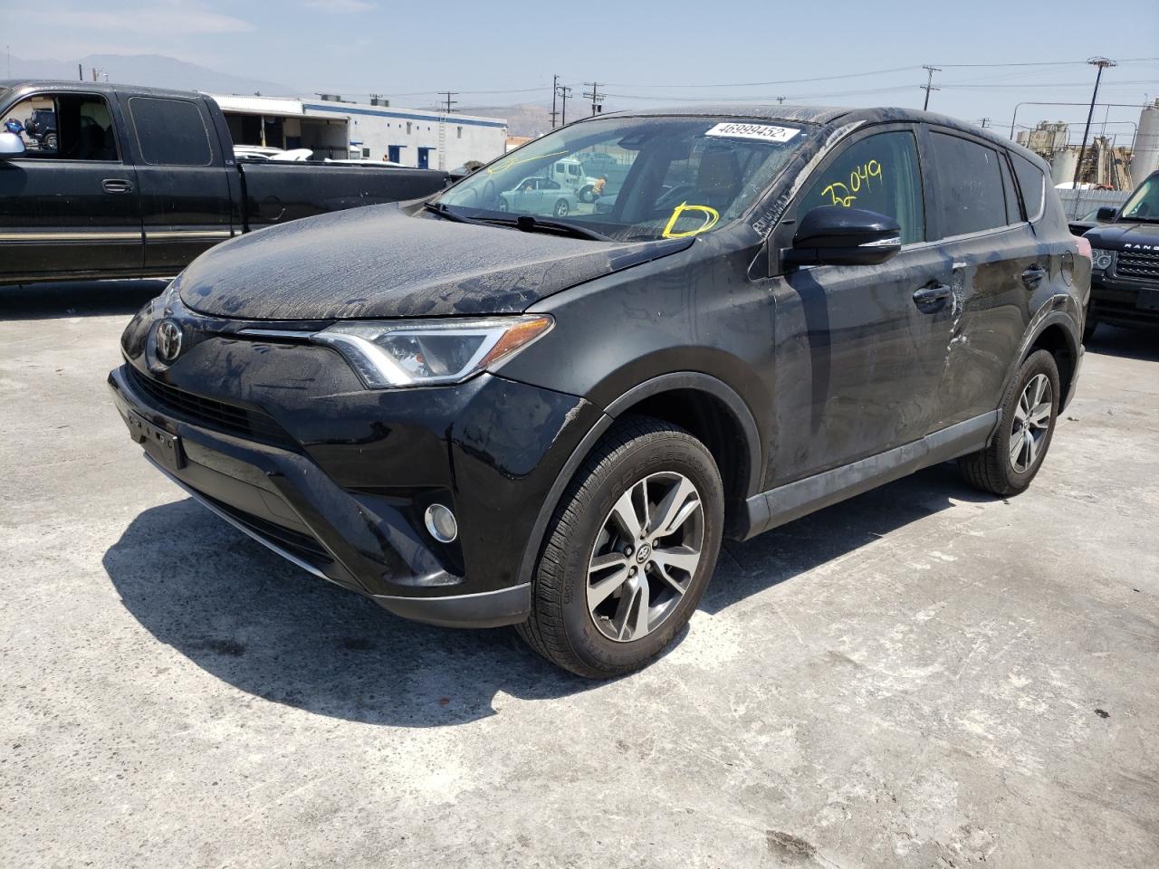 Photo 2 from auction – 2017 TOYOTA RAV4 XLE with VIN 2T3WFREV6HW384441