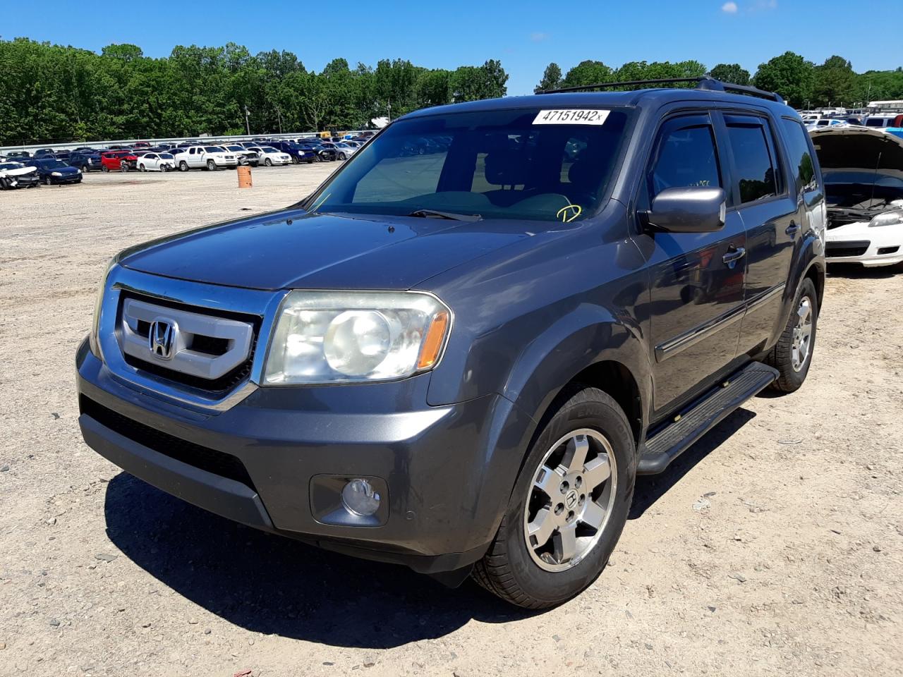 Photo 2 from auction – 2011 HONDA PILOT TOUR with VIN 5FNYF4H93BB016631