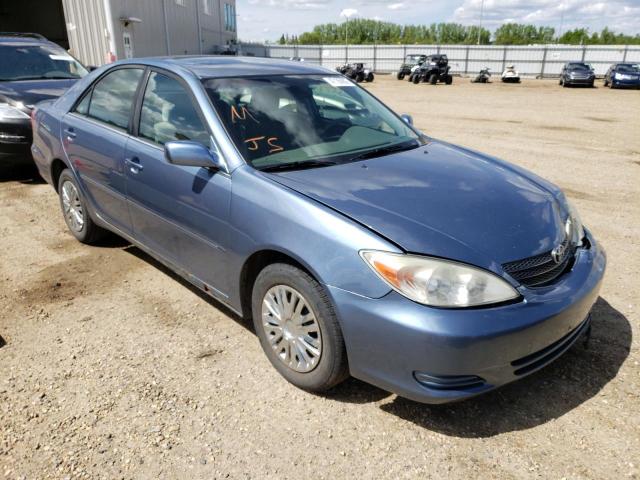 TOYOTA CAMRY LE 2002 with VIN JTDBE30K820010940 - Photo from auction