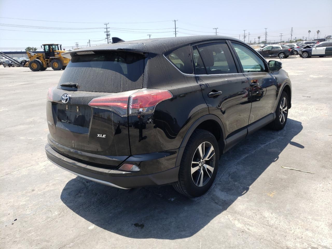 Photo 4 from auction – 2017 TOYOTA RAV4 XLE with VIN 2T3WFREV6HW384441