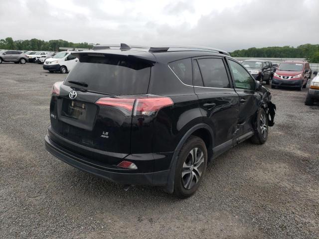 Photo 4 from auction – 2018 TOYOTA RAV4 LE with VIN 2T3BFREV7JW805099
