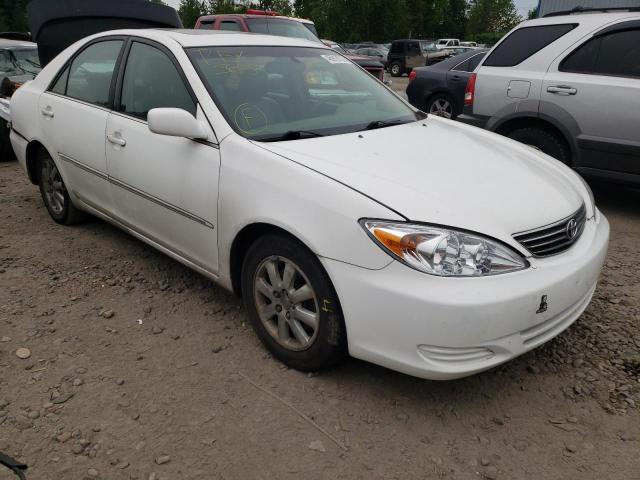 TOYOTA CAMRY LE 2002 with VIN 4T1BF30K42U007034 - Photo from auction