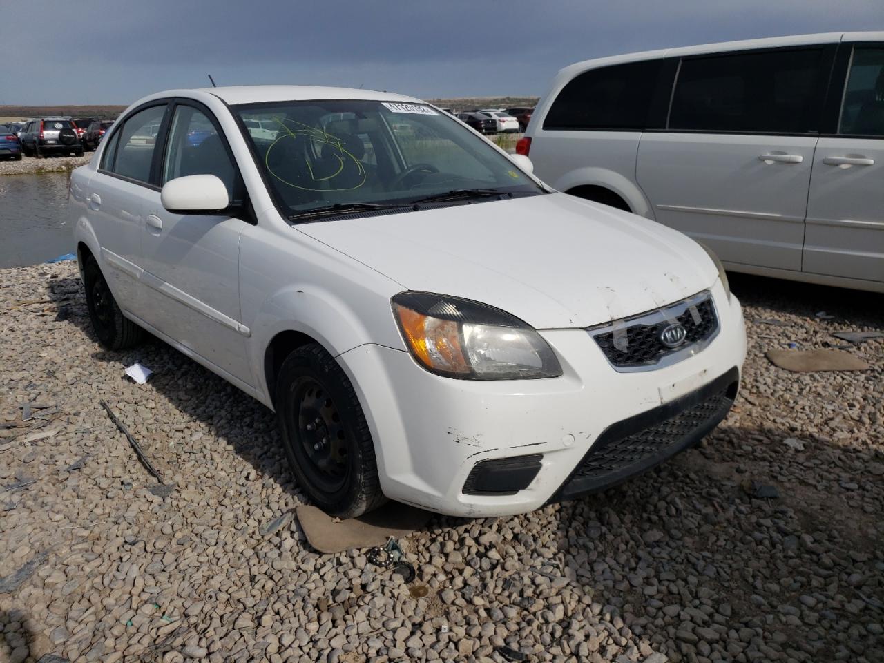 Photo 14 from auction – 2010 KIA RIO LX with VIN KNADH4A38A6600447