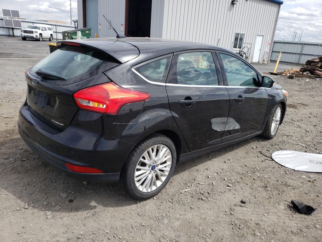 Photo 16 from auction – 2015 FORD FOCUS TITA with VIN 1FADP3N26FL300907